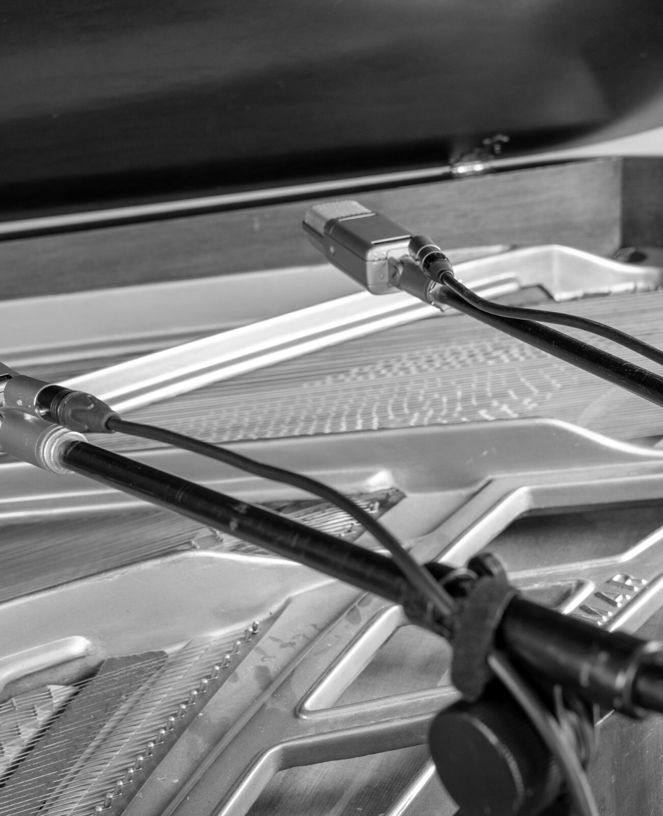 Microphones mounted inside a grand piano.